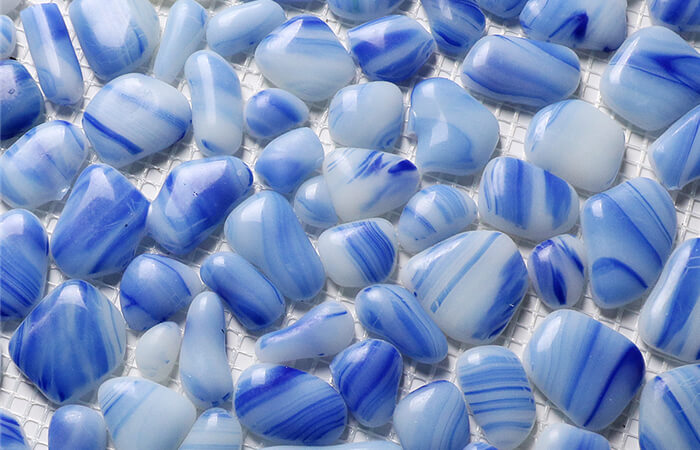 light blue glass made pebble shaped pool finish.jpg