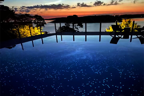 glow in the dark fluorescent pool tile as hotel pool