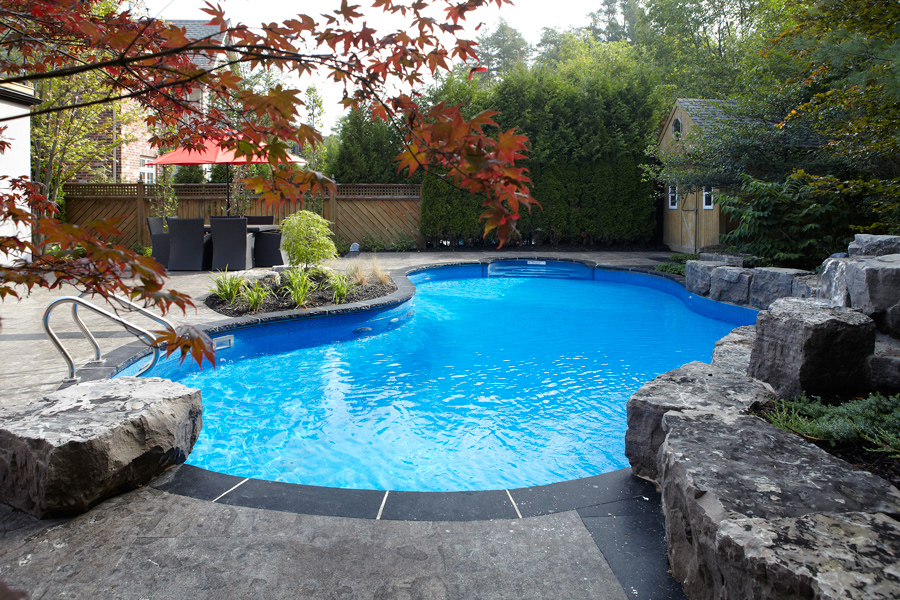 semi inground swimming pool.jpg