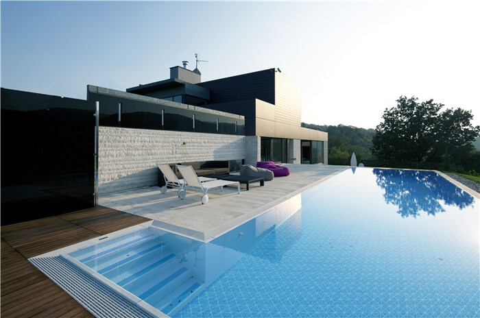 villa outdoor swimming pool using light blue triangle mosaic pool tiles.jpg