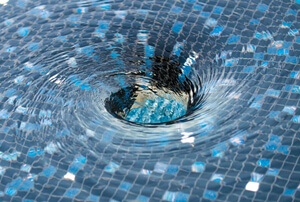 drain pool water little below the pool border tile.jpg