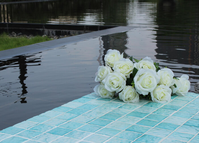 wave mosaic tile pool side decor.jpg