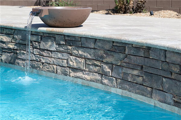 stone waterline tile for swimming pool.jpg