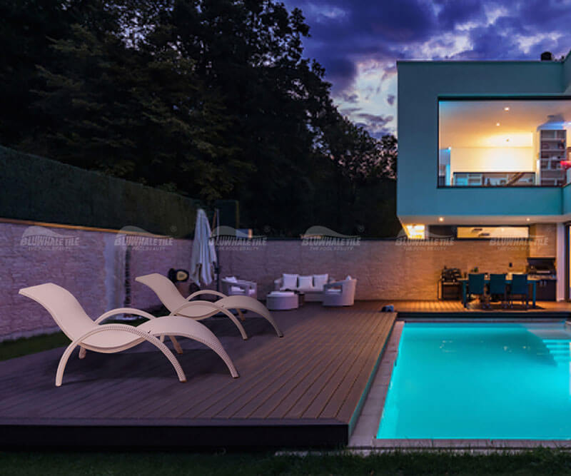 sun loungers in poolside