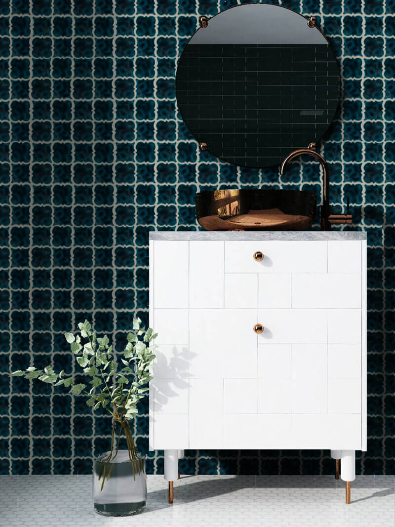 Deep blue wall tiles in bathroom